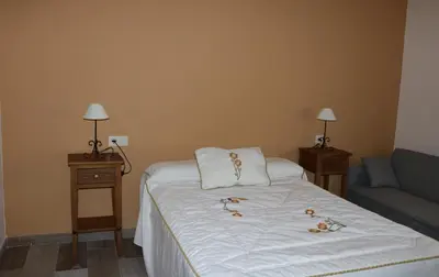 Cama o camas de una habitación en Casa Rural 