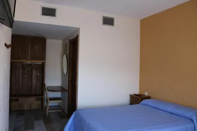 Cama o camas de una habitación en Casa Rural 