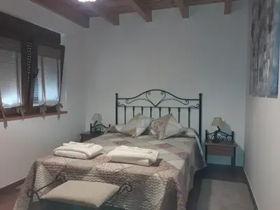 Cama o camas de una habitación en El Rondillo de Gredos