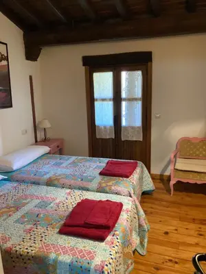 Cama o camas de una habitación en Casa rural Adelaida