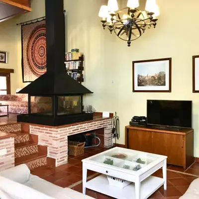 Una televisión o centro de entretenimiento en Casa Roble
