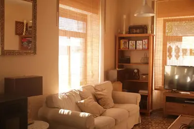 Una televisión o centro de entretenimiento en Hotel Villa Maria