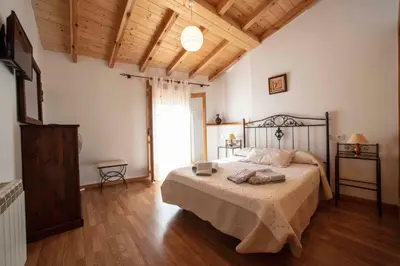 Cama o camas de una habitación en El Capricho