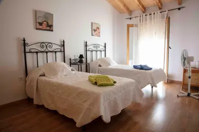 Cama o camas de una habitación en El Capricho
