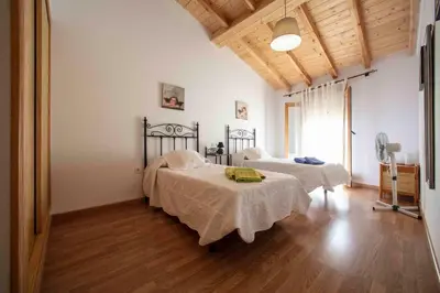 Cama o camas de una habitación en El Capricho
