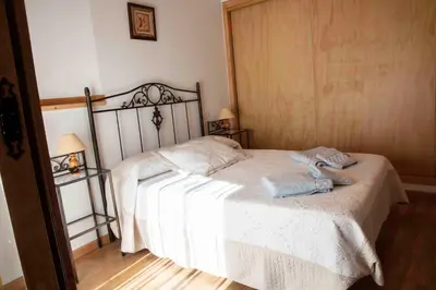 Cama o camas de una habitación en El Capricho