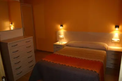 Cama o camas de una habitación en Hostal Hispanico I