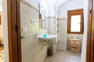 Un baño de Apartamentos Rurales Tía María