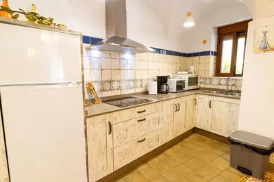 Una cocina o zona de cocina en Apartamentos Rurales Tía María