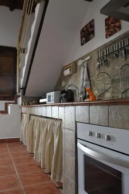 Una cocina o zona de cocina en Casa Rural La Coscoja