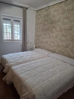 Cama o camas de una habitación en Casa La Sinagoga de Trujillo