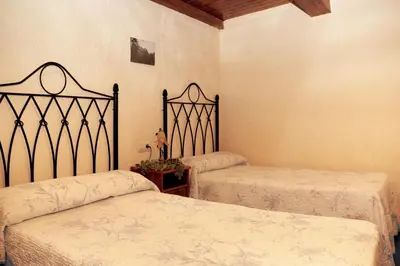 Cama o camas de una habitación en Mirador Los Cotos