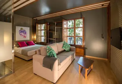 Cama o camas de una habitación en Apartamentos Ele San Justo Plaza