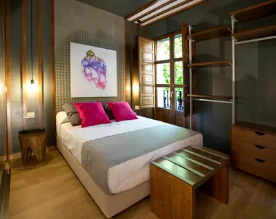 Cama o camas de una habitación en Apartamentos Ele San Justo Plaza