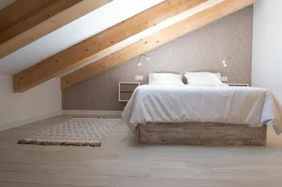 Cama o camas de una habitación en BeSalamanca