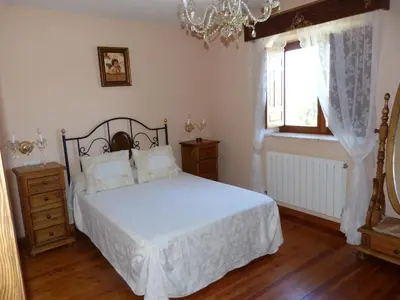 Cama o camas de una habitación en Casa Rural La Fuente