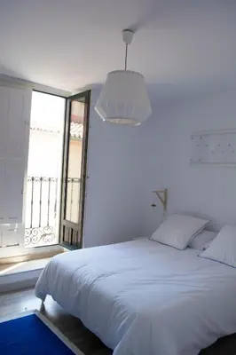 Cama o camas de una habitación en VIVIENDA DE USO TURÍSTICO CASA ABAD