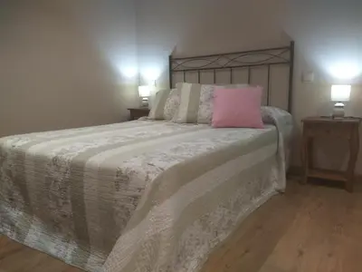 Cama o camas de una habitación en Casa Rural Isabel
