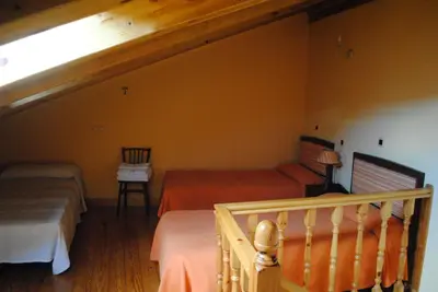 Cama o camas de una habitación en Casa Cabañal