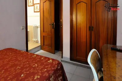 Cama o camas de una habitación en Hotel Aragón