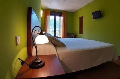 Cama o camas de una habitación en Hotel Rural Los Molinillos