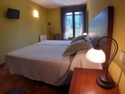 Cama o camas de una habitación en Hotel Rural Los Molinillos