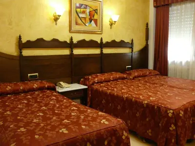 Cama o camas de una habitación en Hotel Reyes Catolicos