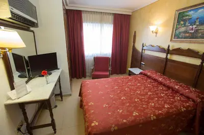 Cama o camas de una habitación en Hotel Reyes Catolicos