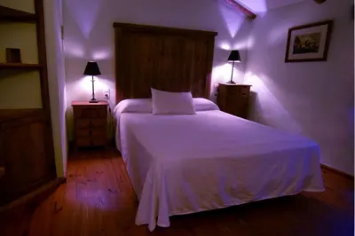 Cama o camas de una habitación en Puerto Roque Turismo Rural