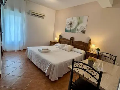 Cama o camas de una habitación en Hostal El Rincon de la Vera