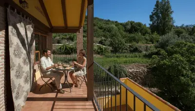Un balcón o terraza de Casas Rurales Acebuche , Cerezo en Flor & Valle del Ambroz
