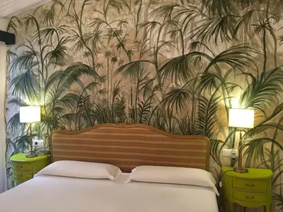 Cama o camas de una habitación en La Tierra Roja