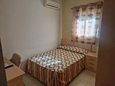 Cama o camas de una habitación en Hostal Talavera
