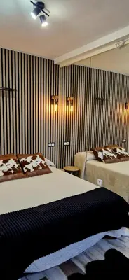 Cama o camas de una habitación en Junior Suites con Jacuzzi
