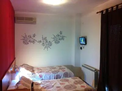 Cama o camas de una habitación en Hostal Neptuno