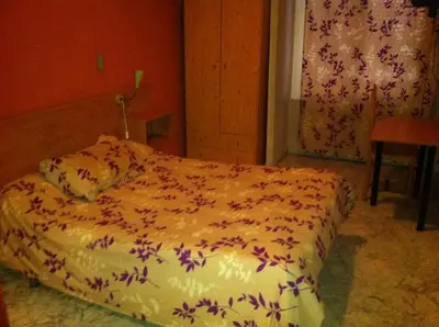 Cama o camas de una habitación en Hostal Neptuno