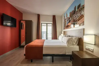 Cama o camas de una habitación en Baluart Apartments