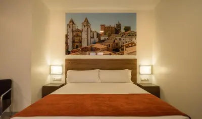 Cama o camas de una habitación en Baluart Apartments