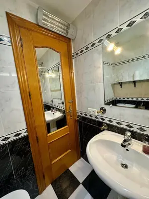Un baño de A.T. La Plaza