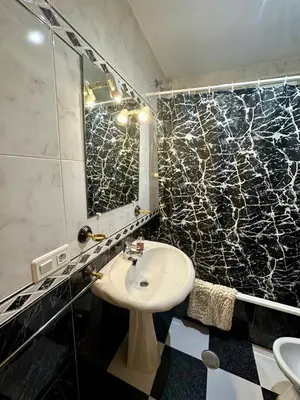 Un baño de A.T. La Plaza