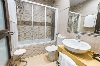 Un baño de Hotel Machaco