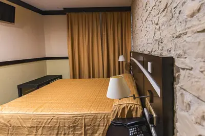 Cama o camas de una habitación en Hotel Machaco