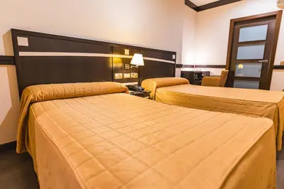Cama o camas de una habitación en Hotel Machaco