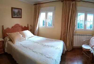 Cama o camas de una habitación en Casa Rural La Cucurrumacha
