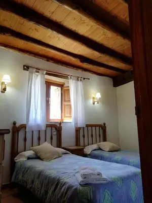Cama o camas de una habitación en Casa Rural La Pontezuela Abajo