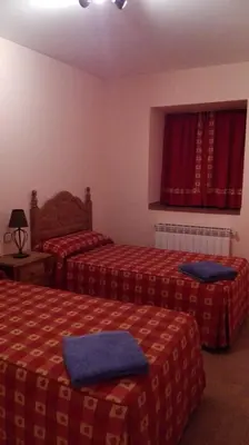 Cama o camas de una habitación en Casa Rural el Picozo