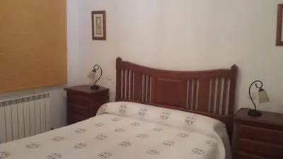 Cama o camas de una habitación en Casa Rural el Maestro II