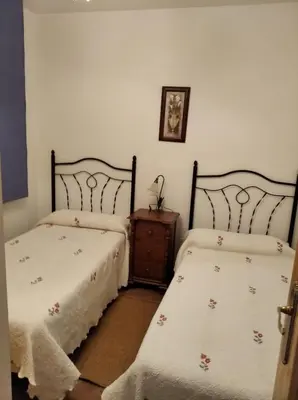 Cama o camas de una habitación en Casa Rural el Maestro II
