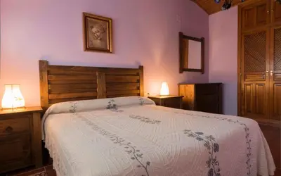 Cama o camas de una habitación en Vivienda de Uso Turístico La Atalaya