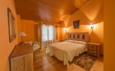 Cama o camas de una habitación en Vivienda de Uso Turístico La Atalaya